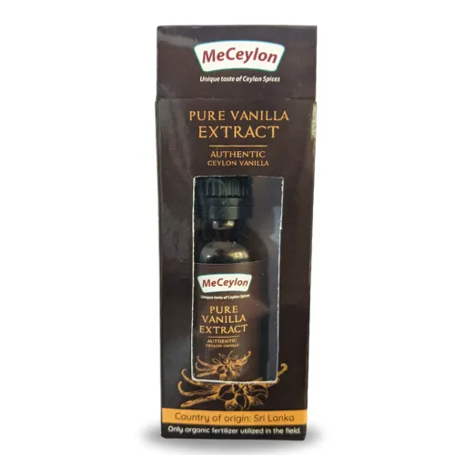 Glass bottle of pure vanilla extract in a dark box labeled "MeCeylon" with Ceylon Vanilla branding.