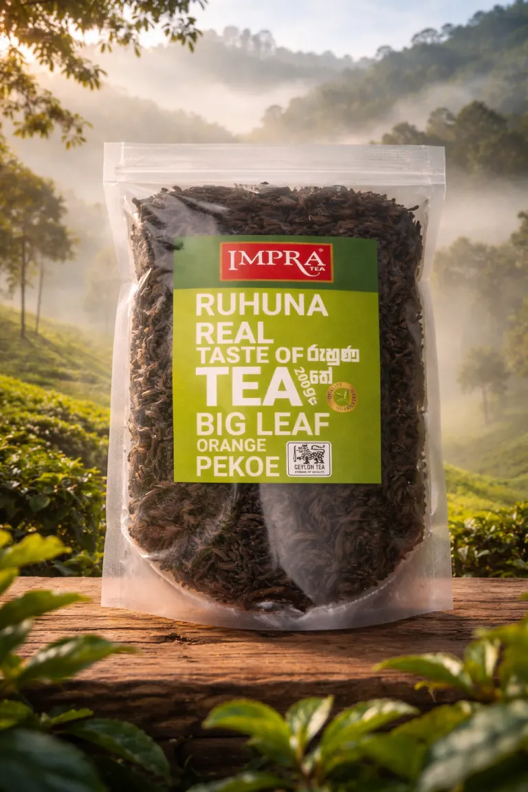 A clear package of Impra Ruhuna tea sits on a wooden surface, surrounded by green tea leaves and hills.