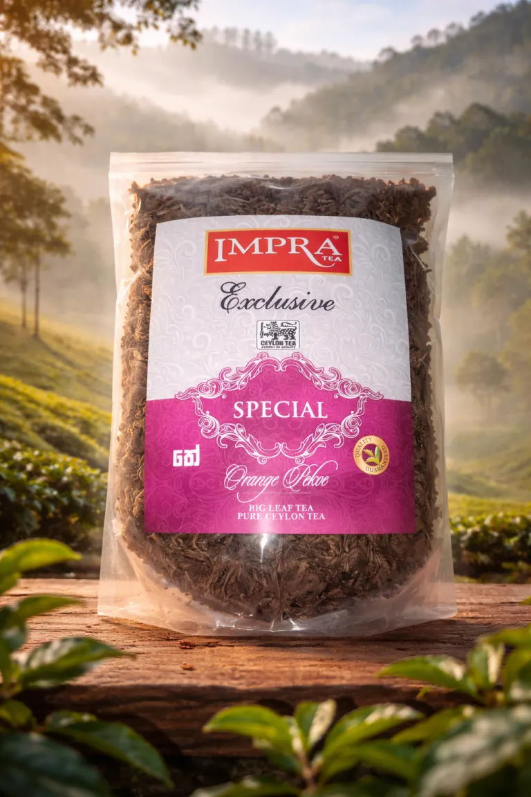 Package of Impra Special Big Leaf Ceylon Tea on a wooden surface with lush green hills in the background.